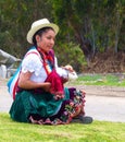 Cholita de Sidcay in typical local dress with guinea pig, Ecuador Royalty Free Stock Photo