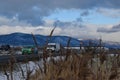 Chomutov, Czech republic - January 10, 2019: Krusne hory ore mountains with cars in foreground in winter after snowfall