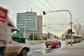 Chomutov, Czech republic - January 07, 2018: traffic lights with green police building before reconstruction in rainy day