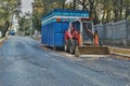 2016/09/24 - Chomutov, Czech republic - little red excavator parked on the street Politickych veznu in Chomutov city during a