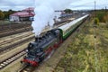 Chomutov, Czech republic - October 19, 2019: black steam locomotive moving to german city of Chemnitz in autumn