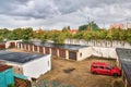 Chomutov, Czech republic - September 17, 2017: Garages with red car in Chomutov city after unexpectedly strong rain at beginning a