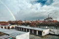 Chomutov, Ustecky kraj, Czech republic - December 11, 2016: garages and road number 13 with clouds and a rainbow on background