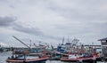 Chon buri,THAILAND-JULY 9,2020 : Fishing boat and fisherma in Thailand at Laemchabang Port in Thailand. Wooden boats. Old boat Royalty Free Stock Photo