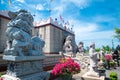 Exterior of Viharn Sien temple with Buddhist statues and sculptures