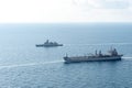 Bhumibol Adulyadej stealth frigate and HMAS Sirius fleet replenishment vessel  sail in the sea Royalty Free Stock Photo