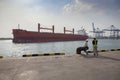 chonburi thailand - february 4,2016 : heavy container ship approaching to laem - chabang port ,laem - chabang important sea trans