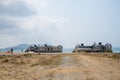 US Marine Corps Landing Craft Air Cushion or LCACs land on the beach