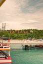 Chonburi, Thailand - July 06 2022: Pattaya sign in the mountain at Bali hai pier with beautiful landscape and cityscape of Pattaya