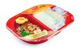 CHONBURI, THAILAND-MAY 15, 2020 : Stir-fried basil pork with rice in red plastic box food package. Microwave food for to go. Ready