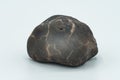 Chondrite Meteorite isolated, a piece of rock formed in outer space in the early stages of Solar System as asteroids. This meteori