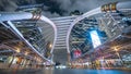 Chong Nonsi Bangkok Sky Train Station Public Skywalk Bridge with the modern buildings on background at night.