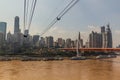 CHONGQING, CHINA - AUGUST 16, 2018: Yangtze River Ropeway and Dongshuimen Bridge in Chongqing, Chi