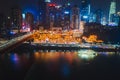 Chongqing, China - Dec 22, 2019: Aerial view of Hong Ya Cave, Historic Chinese folk town with lights on by Jialing River