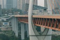 Chongqing, China - Dec 22, 2019: Qian si men suspension bridge deck over Jialing Rivier in cloudy weather