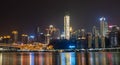 Chongqing, China - Dec 22, 2019: Night neon light pano view of historic architecture in Hongya Dong cave by river