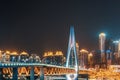 Chongqing skyline at night with a bridge and HongyaDong cave Royalty Free Stock Photo