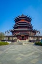 CHONGYUANG TEMPLE, CHINA: Beautiful red and black tower with stunning chinese architecture, seen from medium distance on