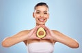 Choose clean beauty - youre too pretty to poison. Studio portrait of an attractive young woman posing with an avocado