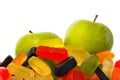 Choose: pile of candy or two apples Royalty Free Stock Photo