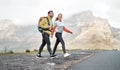 We choose to spend our days in the mountains. Full length shot of two young athletes bonding during a hike outdoors.