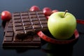 Choose wisely Apple and chocolate, symbolizing health and indulgence