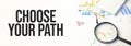 CHOOSE YOUR PATH and office supplies. Business concept Royalty Free Stock Photo