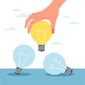 Choosing the best idea. Woman hand hold light bulb, different ways to solve problem, searching strategy, innovation and Royalty Free Stock Photo