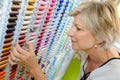 Choosing cotton at haberdashery store