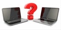 Choosing a laptop. Question sign and laptops. Royalty Free Stock Photo