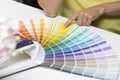 Choosing paint color from tone samples Royalty Free Stock Photo