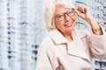 Choosing reading glasses Royalty Free Stock Photo