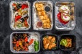 Choosing take away food. Spring rolls, dumplings, gyoza and dessert in lunch box. Take and go organic food. Thai and Asian Royalty Free Stock Photo