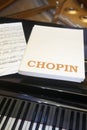 Chopin classical musical score with piano and background Royalty Free Stock Photo