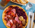 Chopped baked pork knuckle with braised cabbage