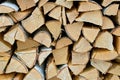 Chopped birch firewood stacked in woodpile Royalty Free Stock Photo