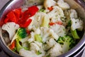 chopped boiled vegetables in colander close-up full frame background Royalty Free Stock Photo