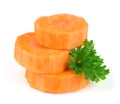 Chopped carrot slices and parsley herb leaves isolated on white background Royalty Free Stock Photo