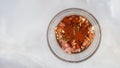 Chopped chicken fillet marinated with garlic, seasoning, paprika, and soy sauce close up in a glass bowl Royalty Free Stock Photo