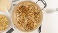 Chopped chicken meat and chopped mushrooms close up on frying pan directly from above. Royalty Free Stock Photo