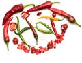 Chopped chili peppers in red color around sign.