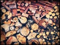 Chopped firewood logs stacked in a wall Royalty Free Stock Photo