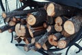 Chopped firewood on a stack in snow Royalty Free Stock Photo