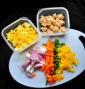 Chopped fresh vegetables on black background Royalty Free Stock Photo