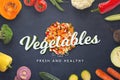 Chopped fresh vegetables and 3D text on black kitchen surface