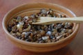 Chopped fried mushrooms in a clay bowl