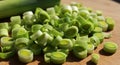 Chopped Green Leeks on Wooden Cutting Board Royalty Free Stock Photo