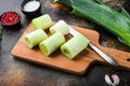 Chopped leek for cooking Braised Leeks with herbs ingredients , on rustic metall background dark, side view Royalty Free Stock Photo
