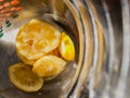 Chopped lemons inside a pitcher