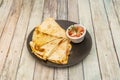 Chopped Mexican synchronized quesadilla stuffed with cochinita stew and melted cheese Royalty Free Stock Photo